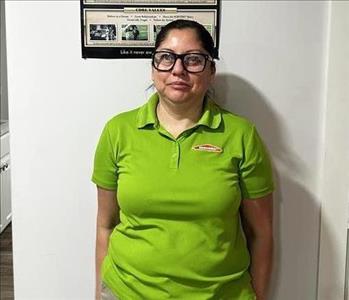 Office Manager posing for Christmas pictures in our waiting room