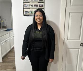 SERVPRO employee posing in our waiting room